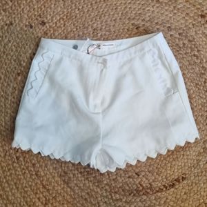 Mika & Gala, size 10, white high-waisted shorts